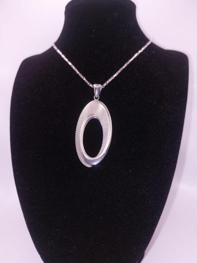 ABARIN - Pendentif en argent sculpté 