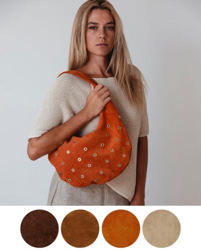 Italian suede handbag for resellers with eyelet details