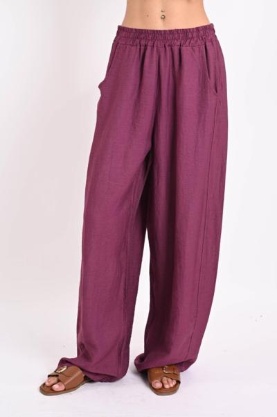 Pantalones holgados morados Made in Italy para revendedores