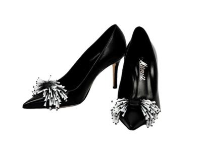 Italian made black leather high heels with decorative detail